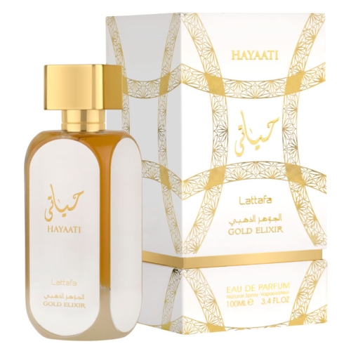 Perfumy damskie Hayaati Gold Elixir Lattafa 100 ml na eleganckim stole, otoczone dekoracyjnymi akcesoriami, które podkre