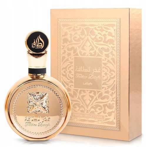 erfumy damskie Fakhar Gold Lattafa 100ml - elegancka butelka na tle opakowania, dostępne na e-drogeria24.pl