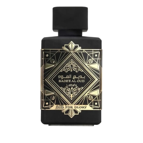Buteleczka perfum unisex Badee Al Oud Lattafa 100 ml - eleganckie, ciemne szkło z ozdobnym korkiem i złotymi detalami. Zdjęcie dostępne na e-drogeria24.pl.Opakowanie perfum unisex Badee Al Oud Lattafa 100 ml - widok z przodu i z boku, ukazujący luksusowe