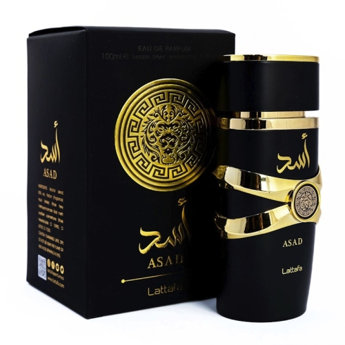 Perfumy męskie Asad Lattafa 100 ml na eleganckim stole, otoczone luksusowymi akcesoriami, podkreślające ich wyrafinowany
